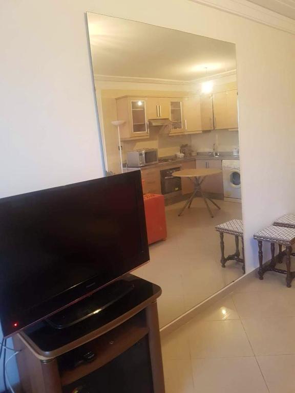 Apartment with one bedroom in Asilah with shared pool and balcony image 1