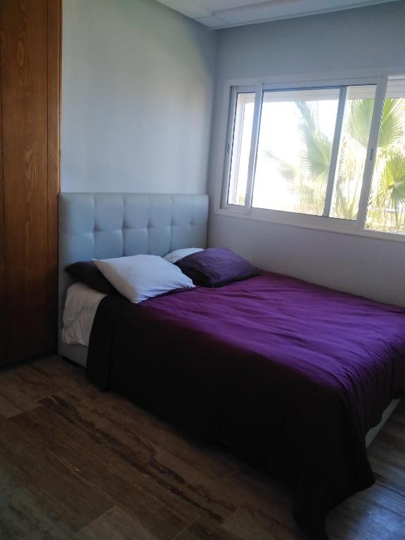 Bel Appartement à PUERTO MARINA-DAR BOUAZZA avec piscines et jardins image 0